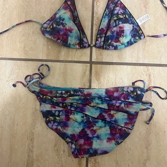 Athleta brand two piece bikini. Great shape. Fun bright colors. Size medium. - Picture 2 of 5